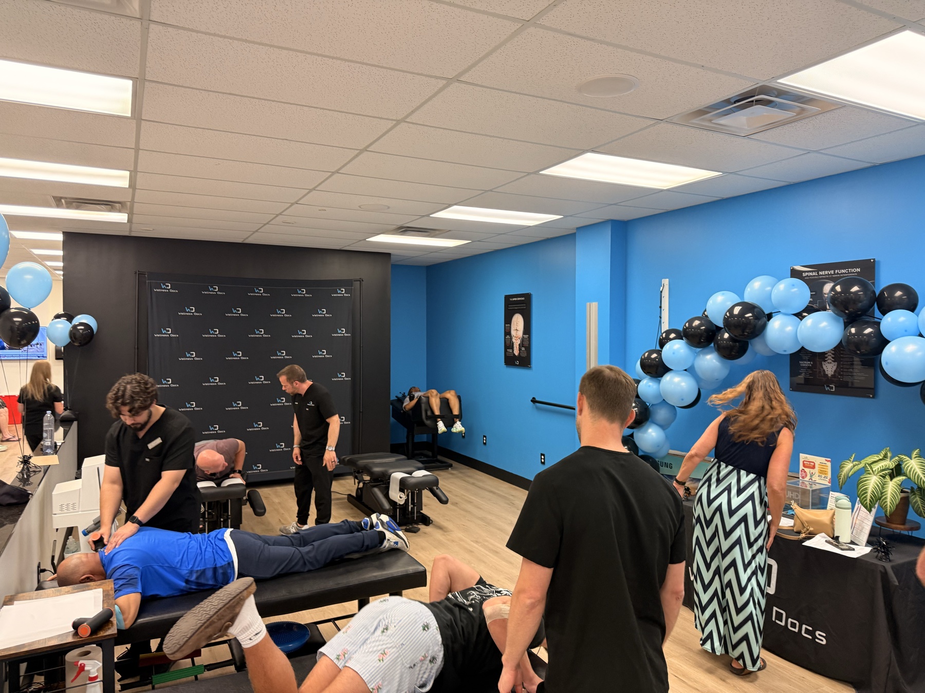 A row of guests getting free massages at the same time