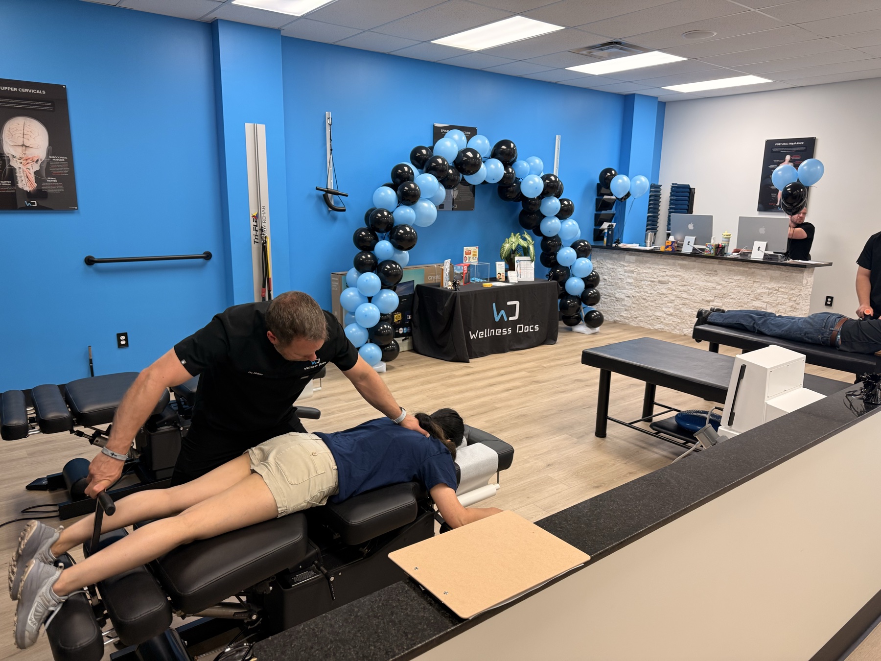 A Wellness Docs provider giving a free massage